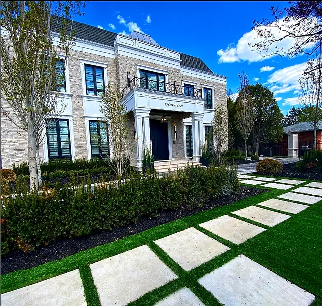 Stepping-stone walk and new planting at the front of a house